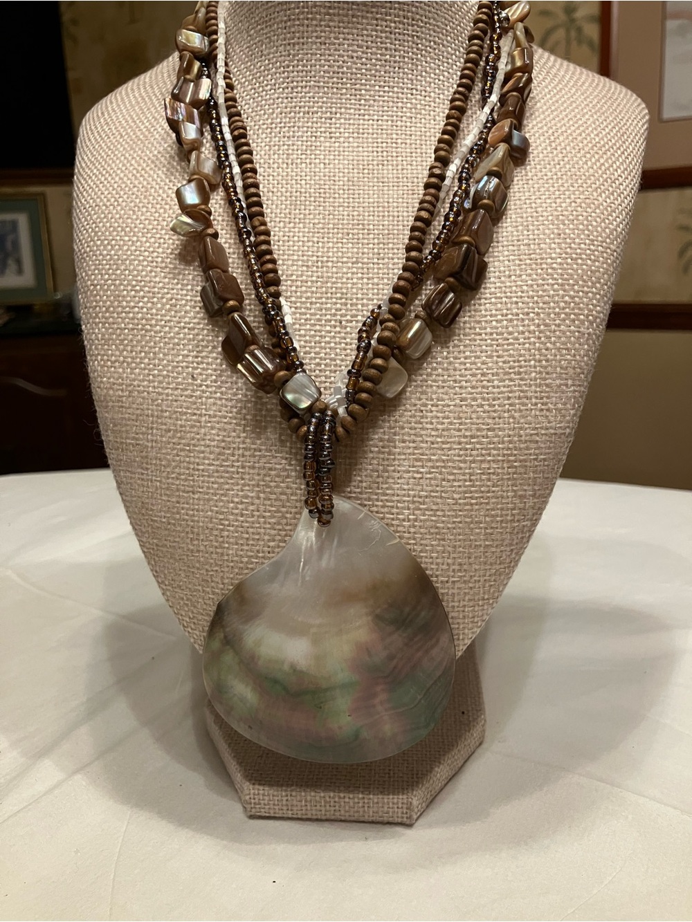 VINTAGE FOUR STRAND-BEADED NECKLACE WITH ABALONE SHELL